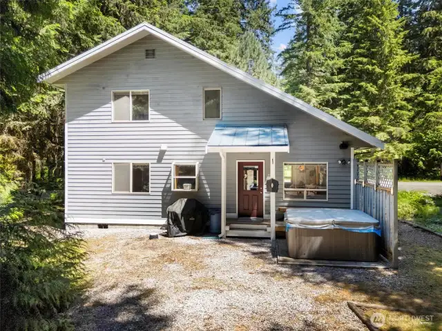 Backyard w/ rear entrance + hot tub