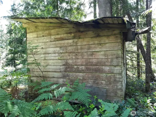 Cedar outbuilding that has served as a sauna.