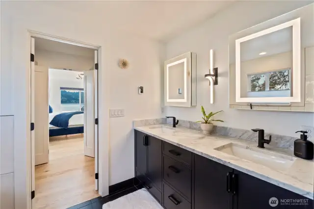Double sinks with custom cabinets for more storage