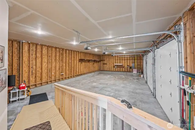 Huge 3 garages with 10 ft x 10 ft garage doors and tall ceiling. Ramp for wheel chair.