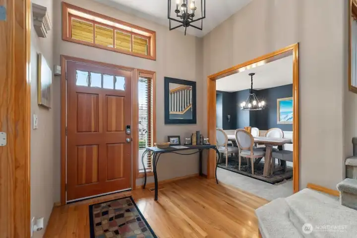 Real wood front door and gleaming hardwoods