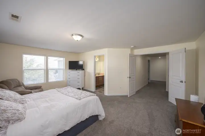 Primary bedroom with primary bathroom