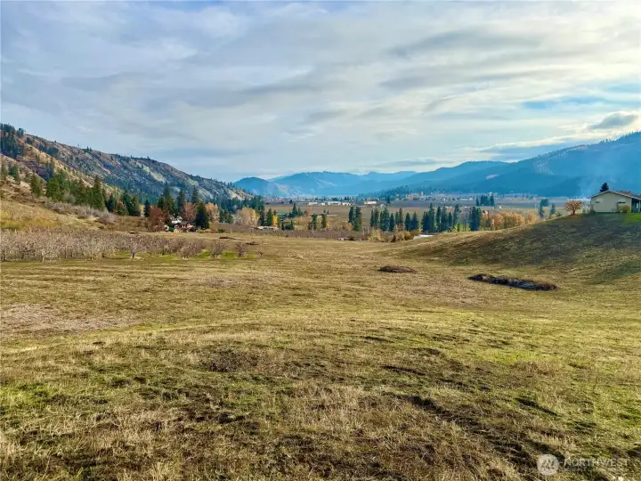 current photo looking across vast lands ready for development.  this view looking SE across project with valley views