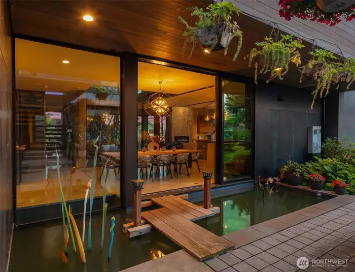 After dinner drinks on the patio?  Just meander across the bridge while koi swim below and enjoy the illuminated glass sculptures along the way!