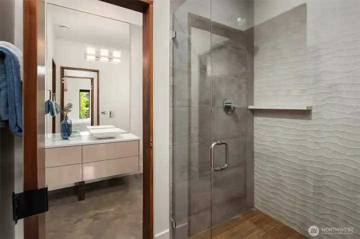 3/4 bath accessible from both the bedroom and hall