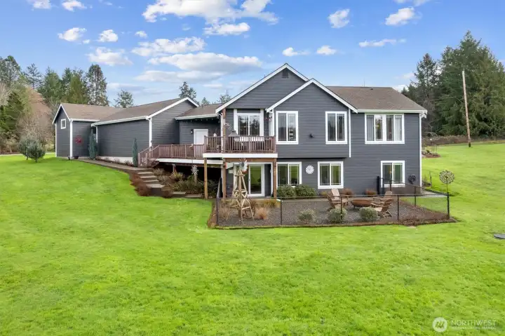 Backyard view of exterior of home