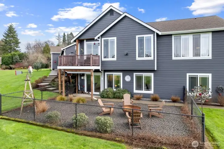 Closer view of fenced space great for pets and evening fireside sunsets