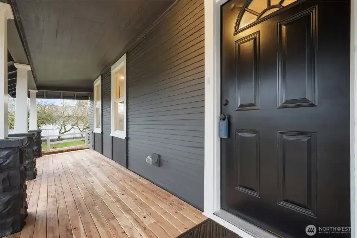 New Porch Decking, Exterior Paint, Front Door, Lighting. Just add Rocking Chairs!!