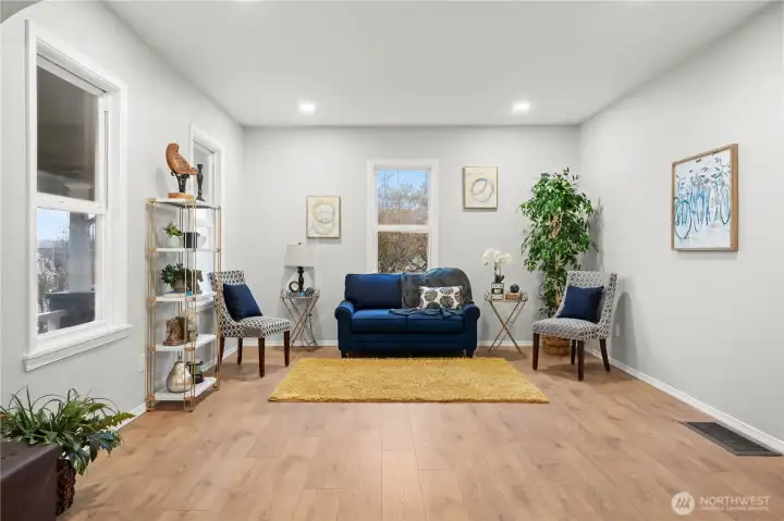 Living Room w/Laminate Floors & Recessed Lighting.