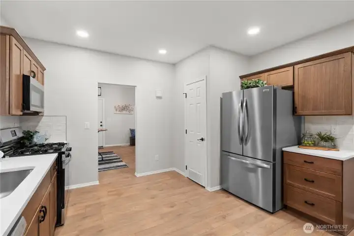 New Paint, Floors, Millwork, Recessed Lighting. Room to add a rolling island, if you'd like!