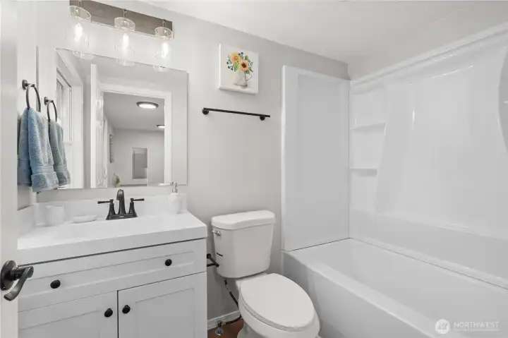 2nd Full Bath: New Vanity, Plumbing & Fixtures, Tub/Shower Surround, Toilet, Laminate Flooring.