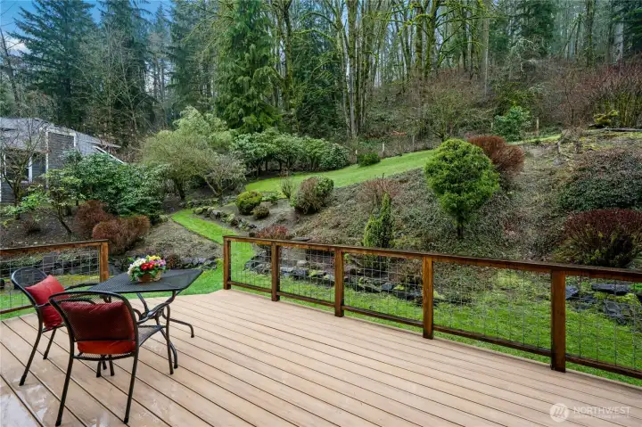 Newer deck to enjoy beautiful landscaping and natural area
