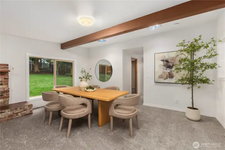 The hallway off of the dining area leads to the 4 bedrooms and two 3/4 bathrooms, flexible to be used for guests, hobbies, work spaces, playrooms and more