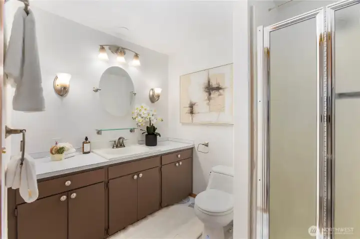 The second 3/4 bathroom with walk-in shower ready to customize to your style