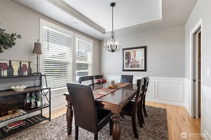 The Dining Room is just off of the entry - freshly painted, new blinds and updating lighting.  Elegant dining with architectural interest added in.