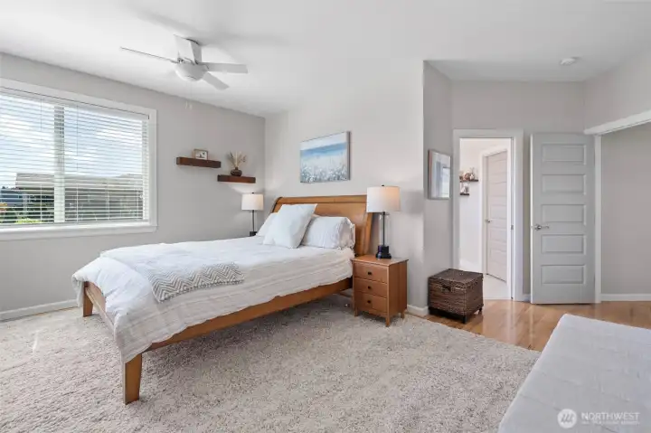 Views continue from the Primary Suite which also allows for deck access.