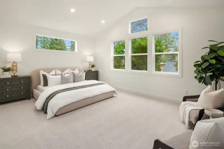 Designer primary suite with five-piece bath with heated floors