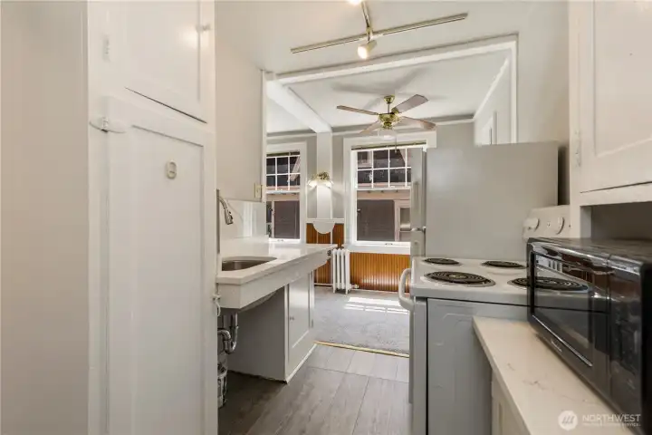 Kitchen view with lots of cabinets adding more storage