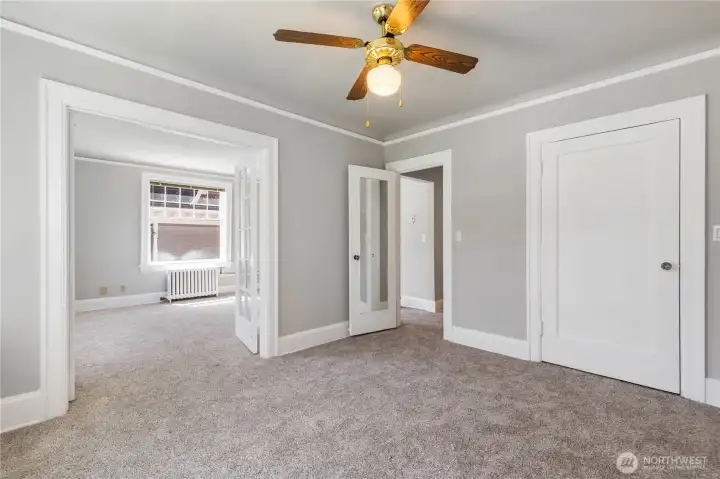 Second view of inside bedroom with two access points from hall way and great room.  There is also large walk in closet for all your stuff