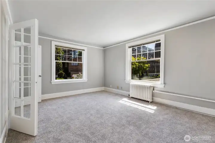 Wonderful great room looking south out windows from your cheery new condo minutes to everything in the city.  Would be great rental or first time home for next buyer at this great price