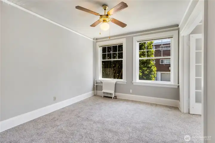 Check out the last view of the bedroom leading out to great room with new paint and carpeting
