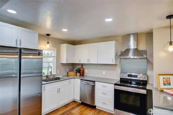 Convenient kitchen with newer apppliances.