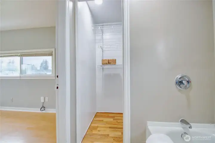 Closet off of primary bathroom.
