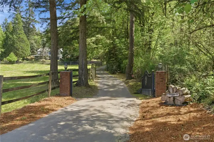 Private gate and winding driveway brings you to this sanctuary! So peaceful and quiet. Private gate and winding driveway brings you to this sanctuary! So peaceful and quiet.