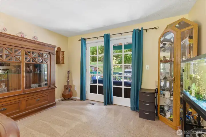 Open the doors to a whole other living space which enjoys patio furniture and fire table. Open the doors to a whole other living space which enjoys patio furniture and fire table.