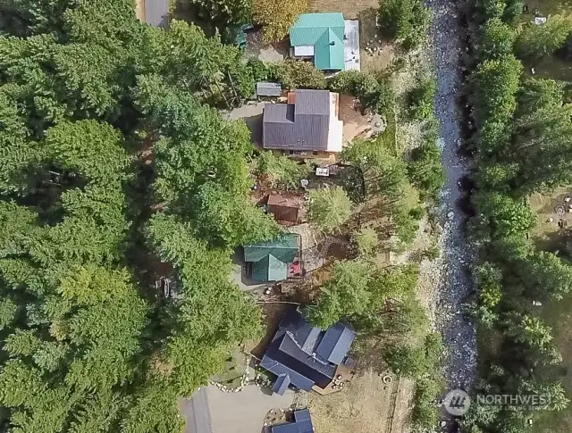 Nice dead-end street with beautiful cabins along the creek