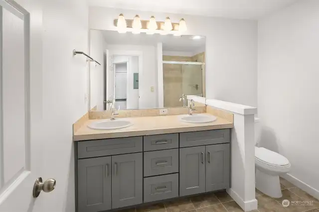 Primary bath with double sinks.