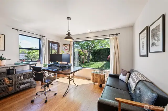 Main floor/den office that overlooks a lovely garden.