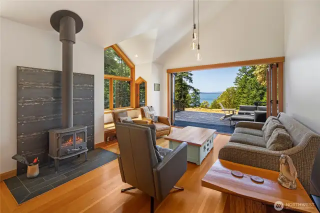 Nano-style doors off the great room open fully to extend living space and enjoyment of view and surrounding nature.