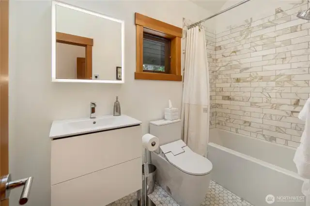 Bathroom off front primary bedroom.