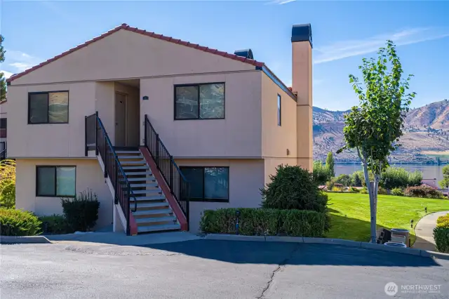 Exterior entry with two parking spaces
