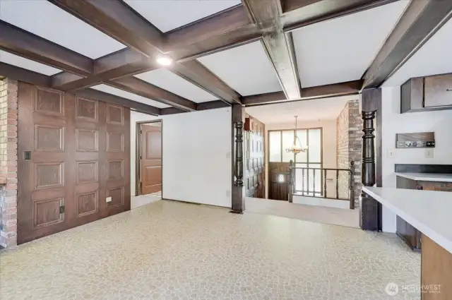 Beamed ceilings and wood paneling