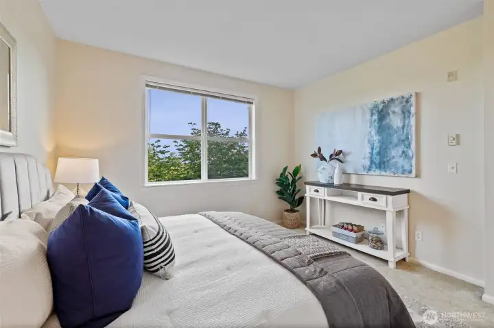 Window in primary bedroom looks out to territorial views. Slide open for a fresh air breeze any time of year.