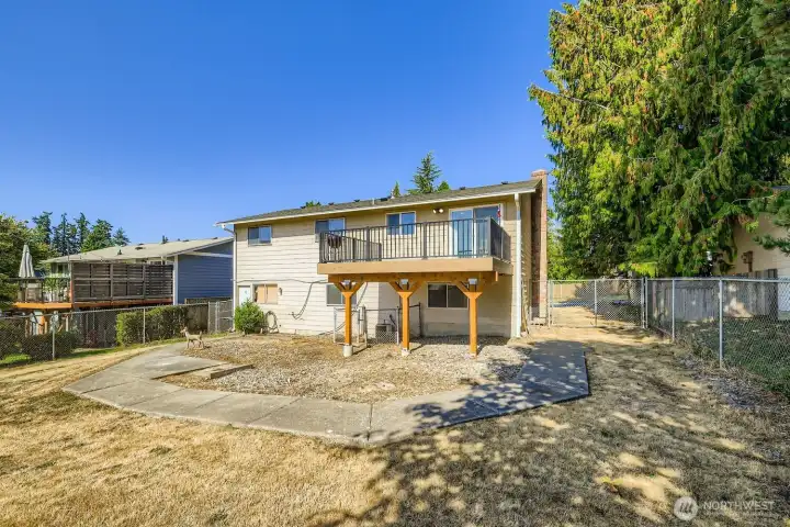 Generous backyard with small shed—perfect for tools or hobbies.
