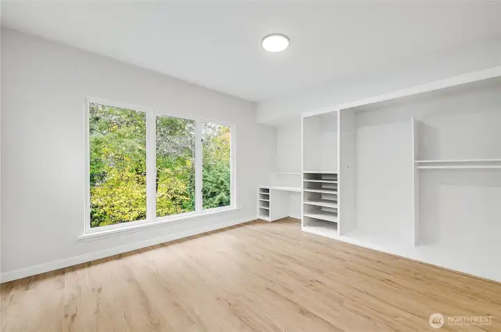 The 2nd bedroom has ample closet space and a built-in desk, very nice!