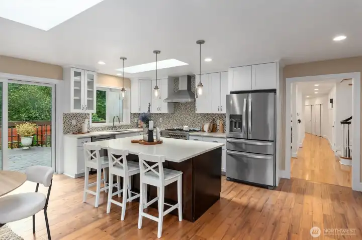 Abundant cabinetry, stainless appliances, and efficient layout for the home chef.