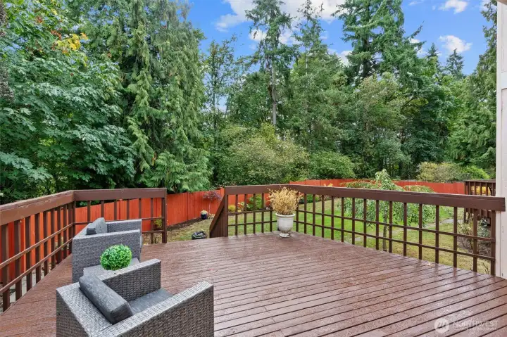 Expansive main-level deck, perfect for grilling, dining, and summer entertaining.