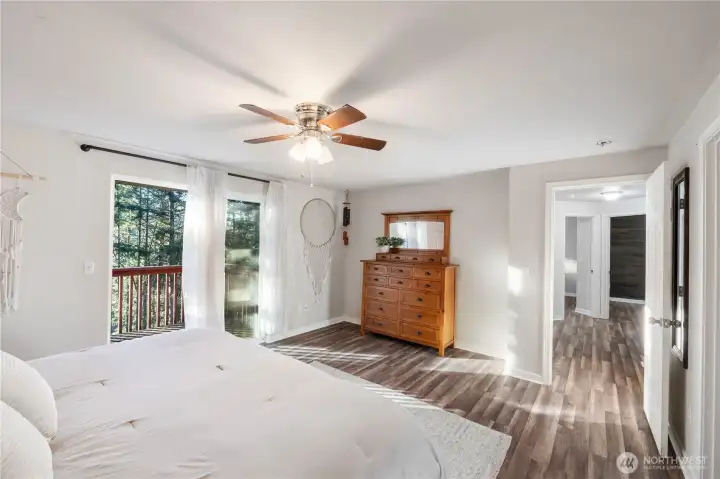 Wake each morning to the birds singing and savor your coffee from the deck. The big walk-in closet is to the right