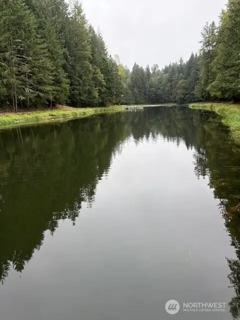 Full view of Horseshoe Lake tucked behind the home