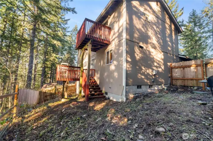 The fenced yard is a canvas for your landscape dreams and space for your people & pets to play