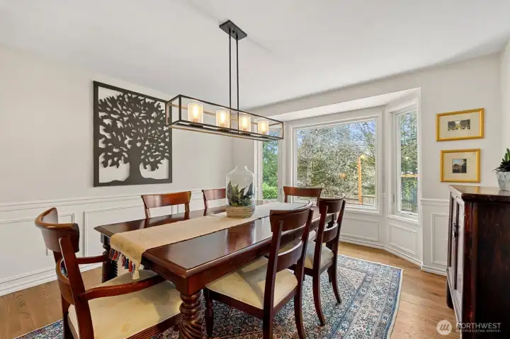 Formal dining room with modern lighting