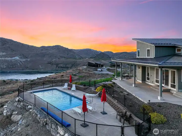 Aerial twilight view of home and pool overlooking Haystack Ridge and the Columbia River.