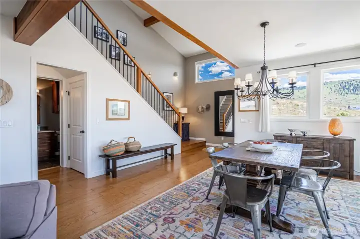 View of Living Room with stairs leading to the upper level living area.