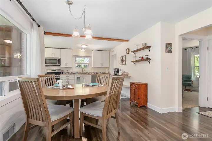 One of the two main floor bedrooms is noted to the right of photo.