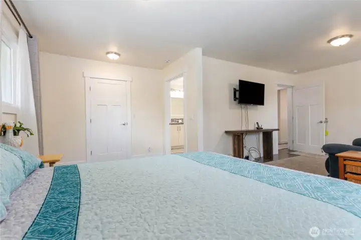 Ample space to convert this primary bedroom into a studio apartment.
