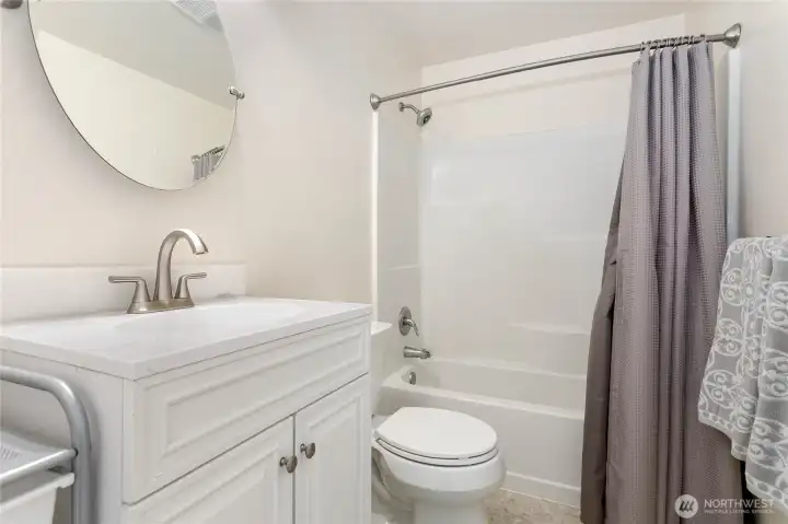 Daylight apartment’s full bathroom.